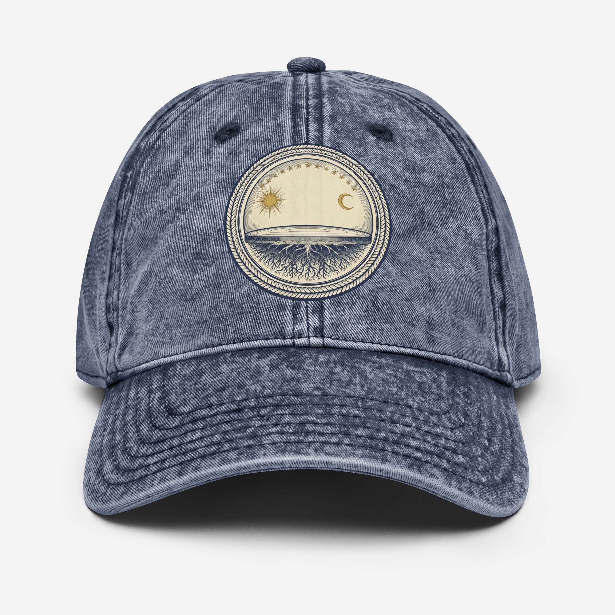 Vintage dad hat with woodcut flat earth firmament design showing stationary earth, sun and moon under protective dome