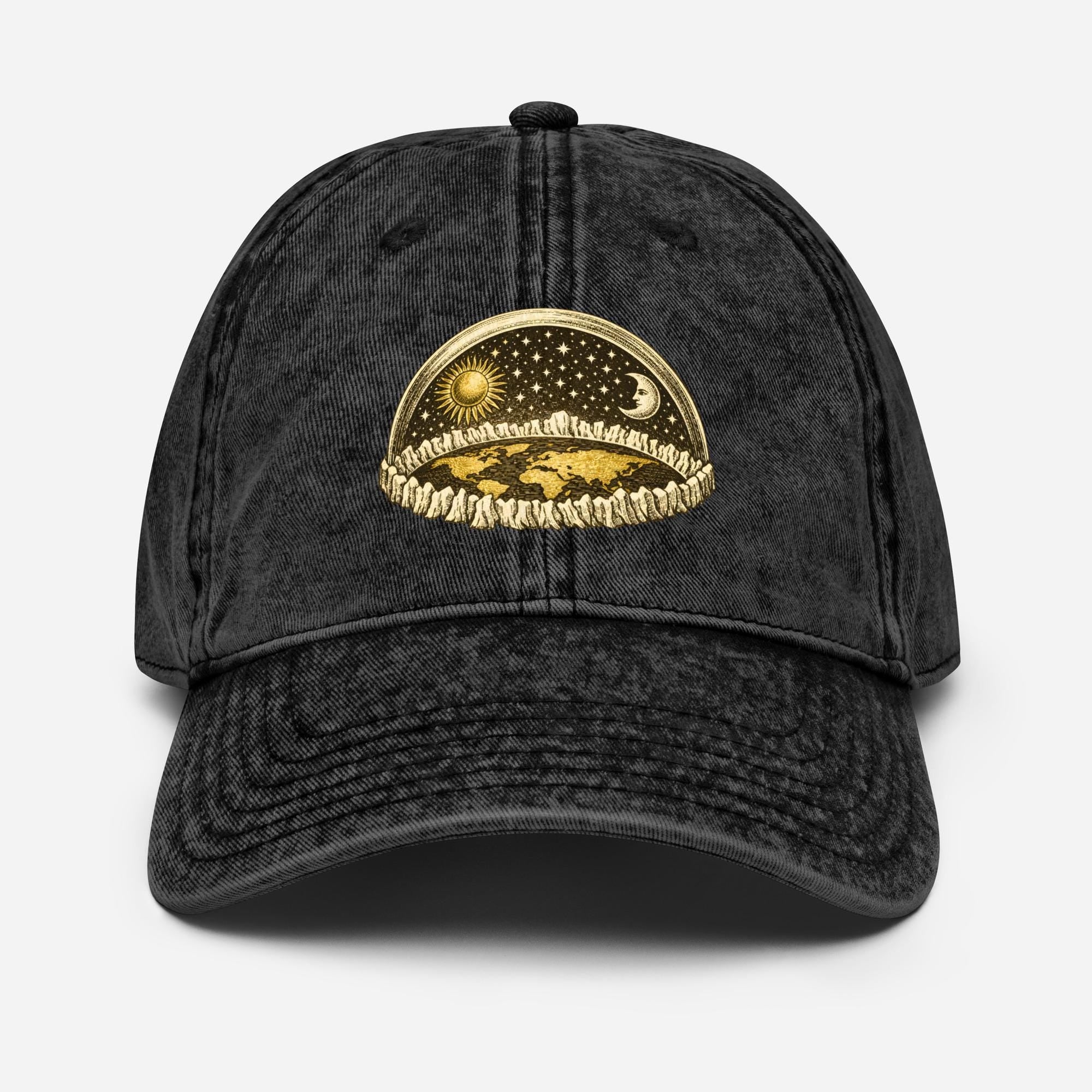 Flat earth firmament dome engraving on distressed vintage dad hat showing ice wall, sun and moon beneath crystalline vault