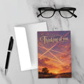 Thinking of you greeting card featuring vintage sunset sky with chemtrails, golden hour clouds, and lone road into horizon